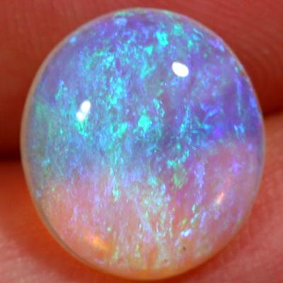 SOLID CRYSTAL OPAL 3D pattern, green over a mauve hue